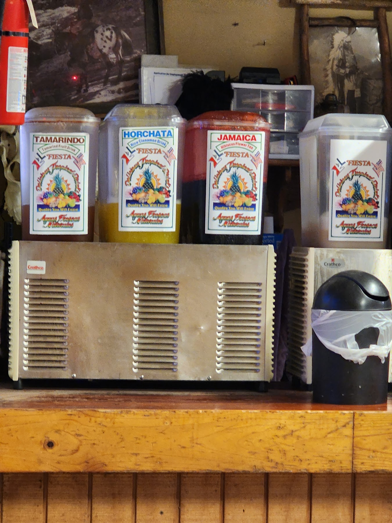 Aguas frescas dispensers - tamarindo, horchata, and jamaica - at Wild West Cowboy Steakhouse.