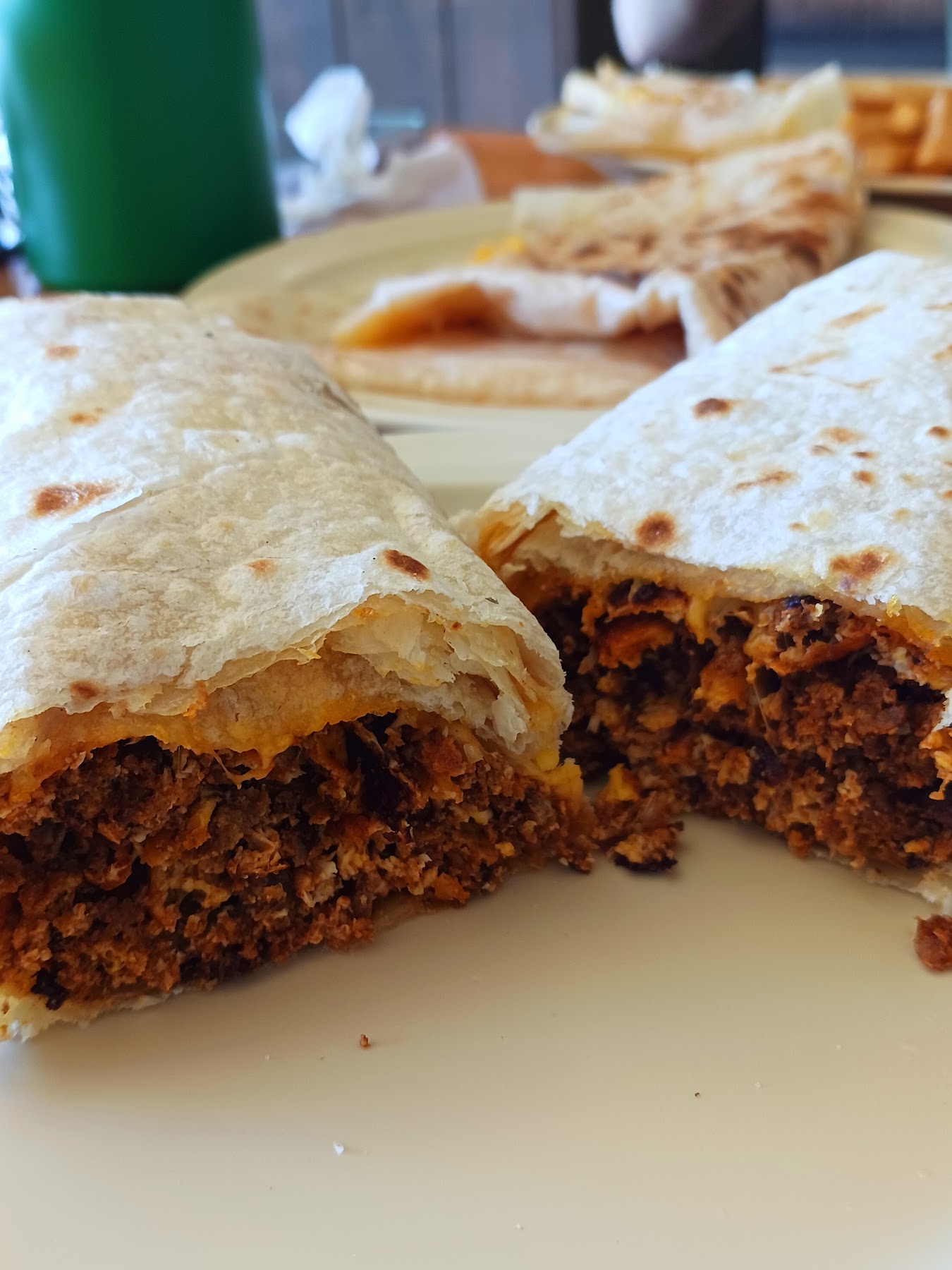 Chorizo burrito cut open showing the filling at Wild West Cowboy Steakhouse.
