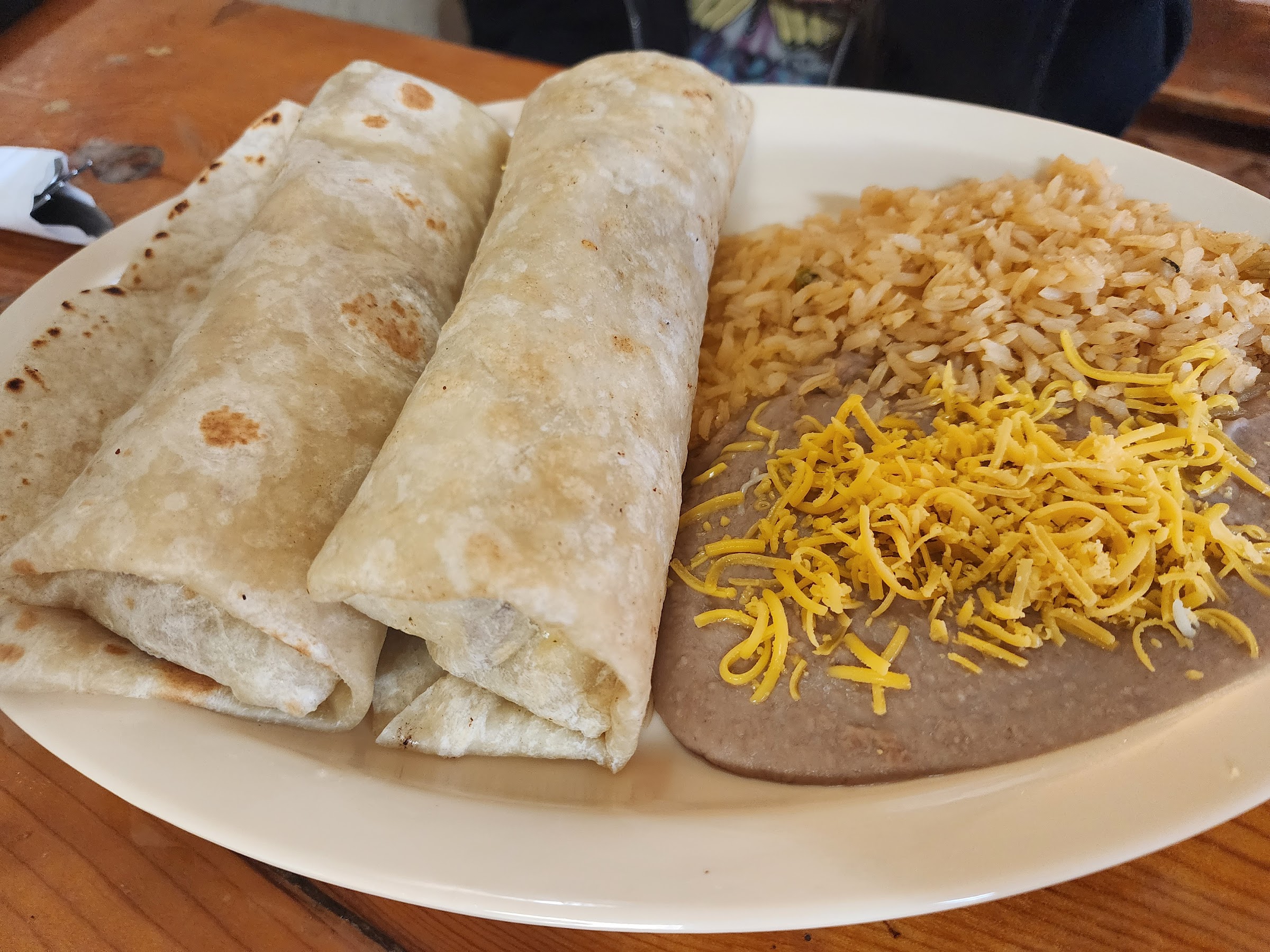 Rolled plate with rice and beans at Wild West Cowboy Steakhouse. TODO: client to swap with a gyro photo.